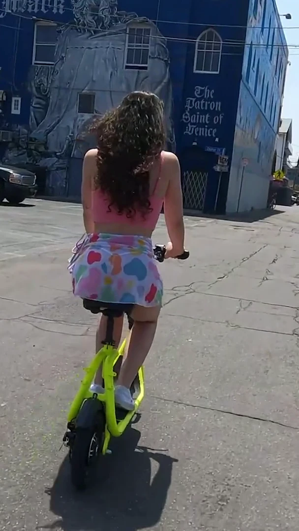 Liz Jordan flashes her ass on a bike