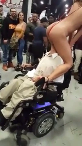 Adriana Chechik giving a disabled fan a taste and the time of his life